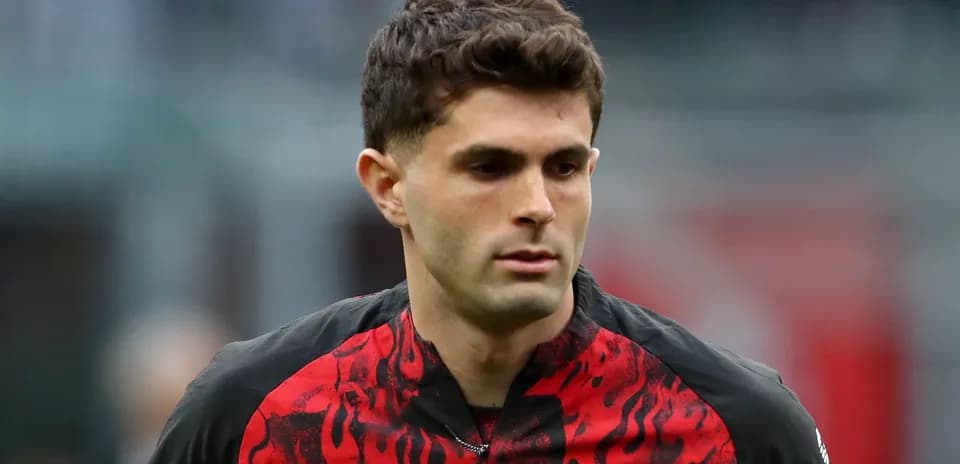 Player in red and black jersey on the field
