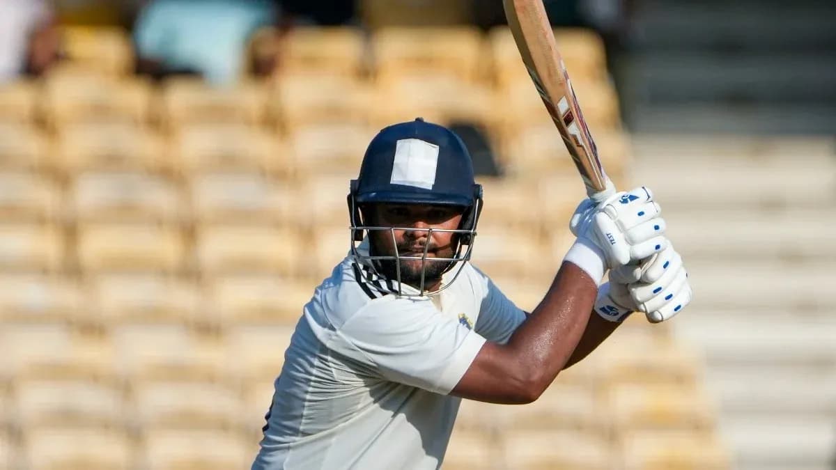 Batsman preparing to strike during cricket match