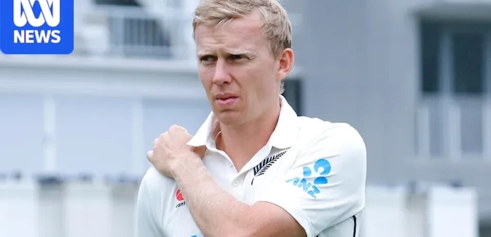 Cricketer in New Zealand jersey adjusting shoulder during practice