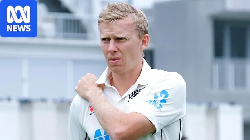 Cricketer in New Zealand jersey adjusting shoulder during practice