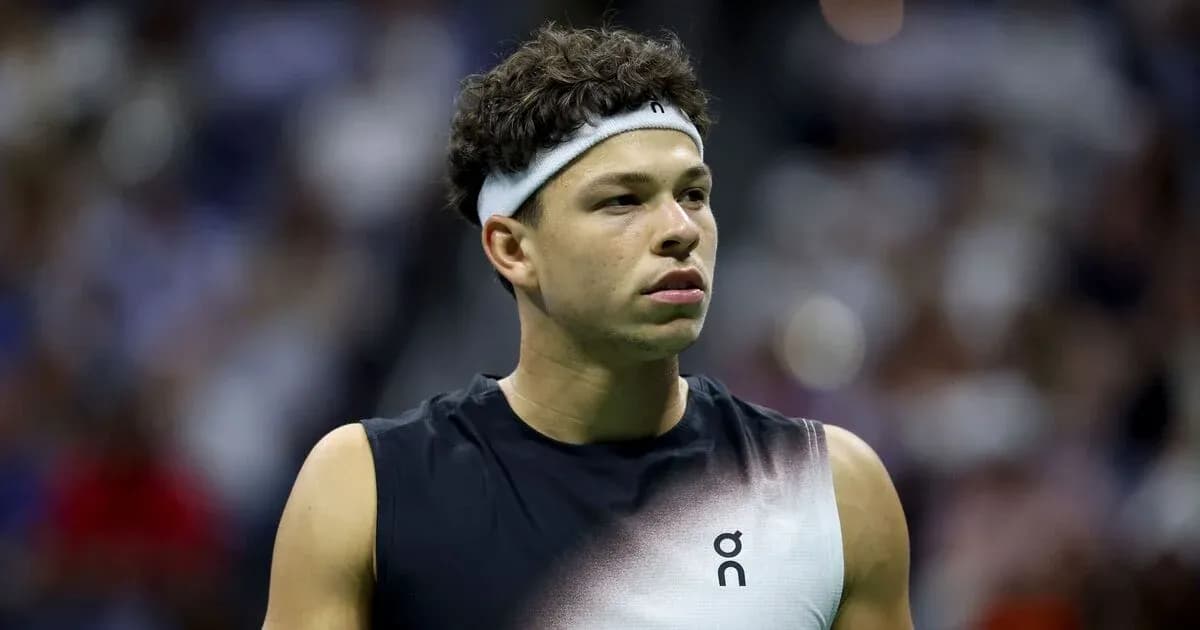 Tennis player wearing headband during match