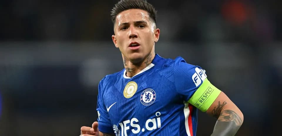 Player wearing Chelsea kit with captain's armband