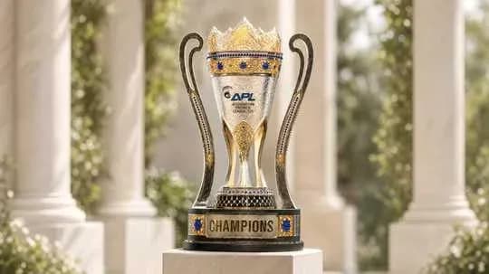 Champions trophy displayed on a pedestal