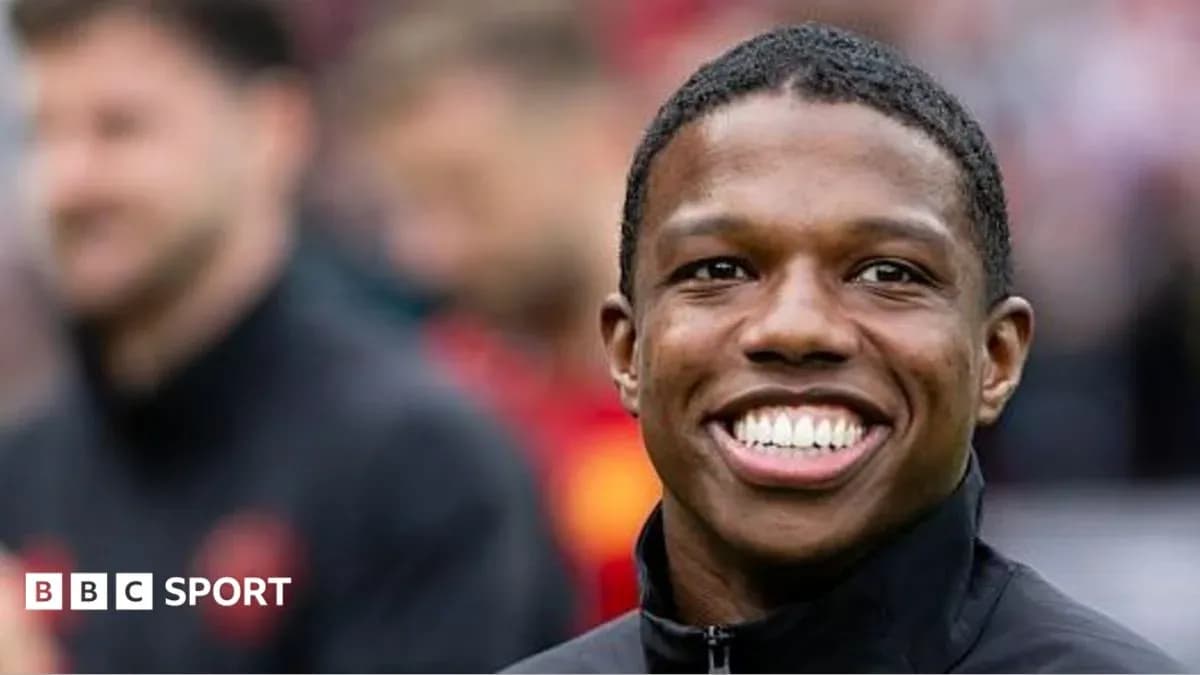 Player smiling during pre-match warm-up
