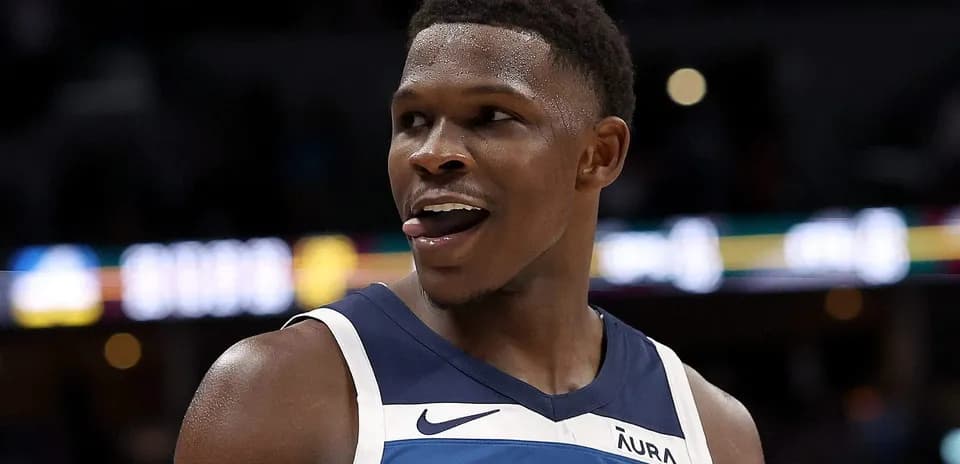 Player smiling and sticking out tongue during game
