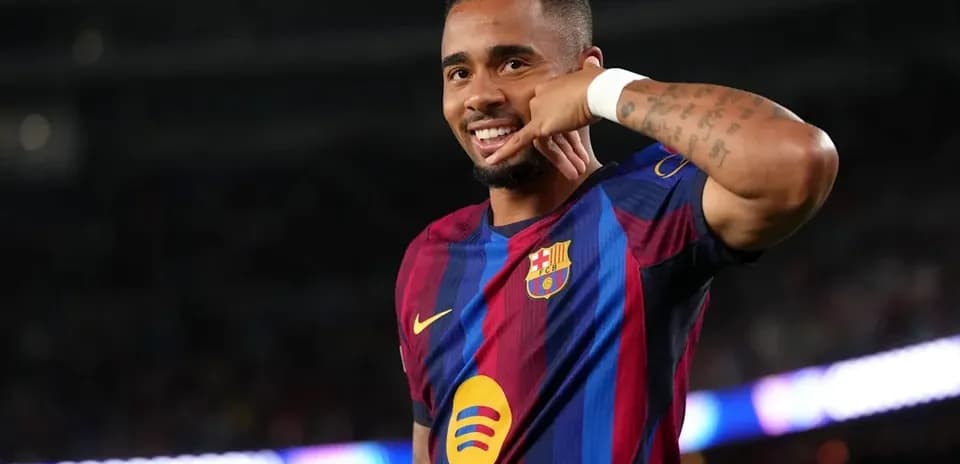 Player celebrating with a phone gesture after scoring
