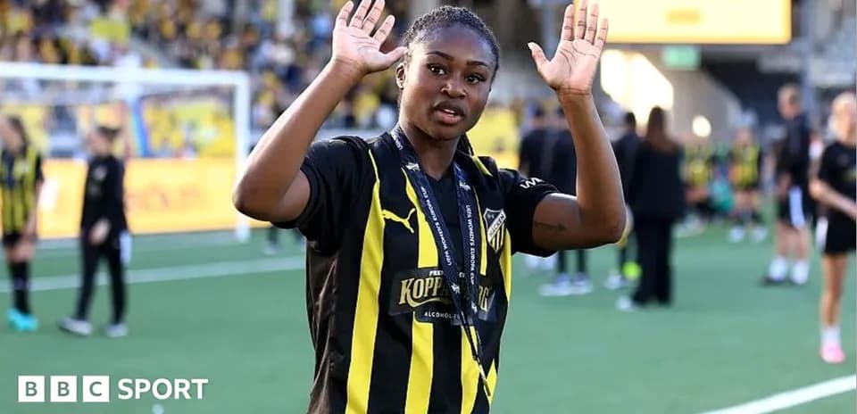 Player waving with hands at the stadium