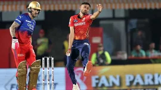 Bowler delivering ball while batsman prepares to strike