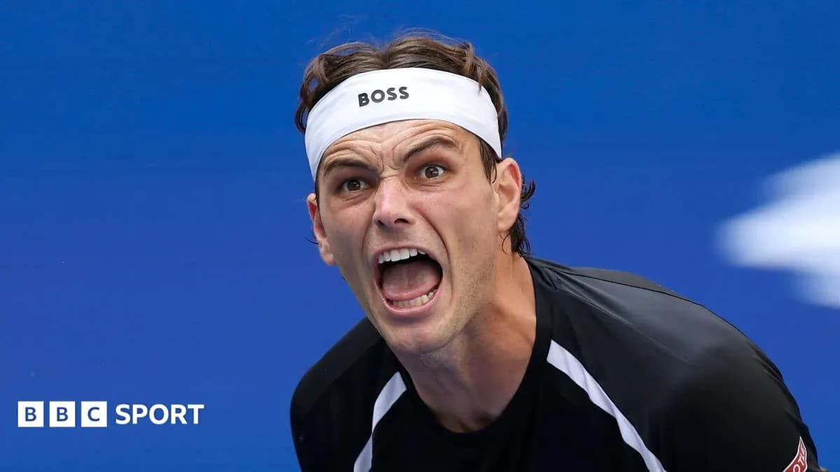 Tennis player shouting during a match