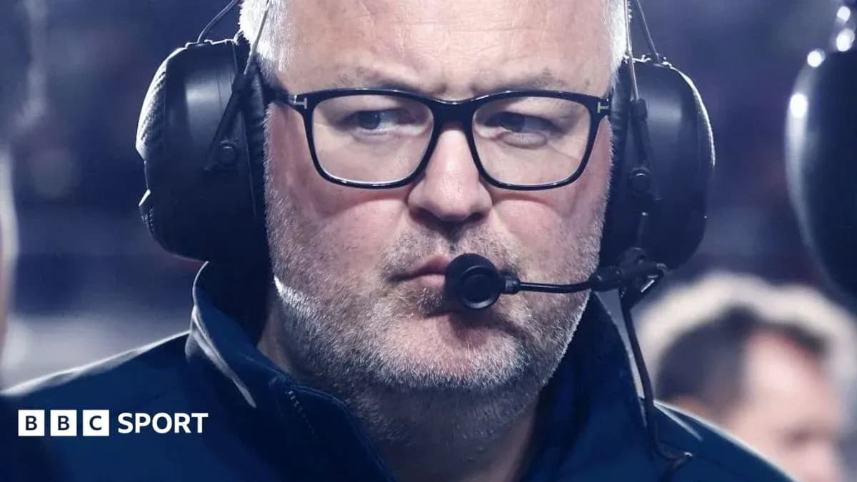Coach wearing headset during a game