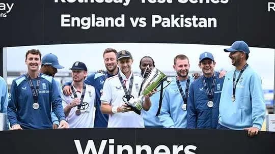 England cricket team celebrating series victory with trophy