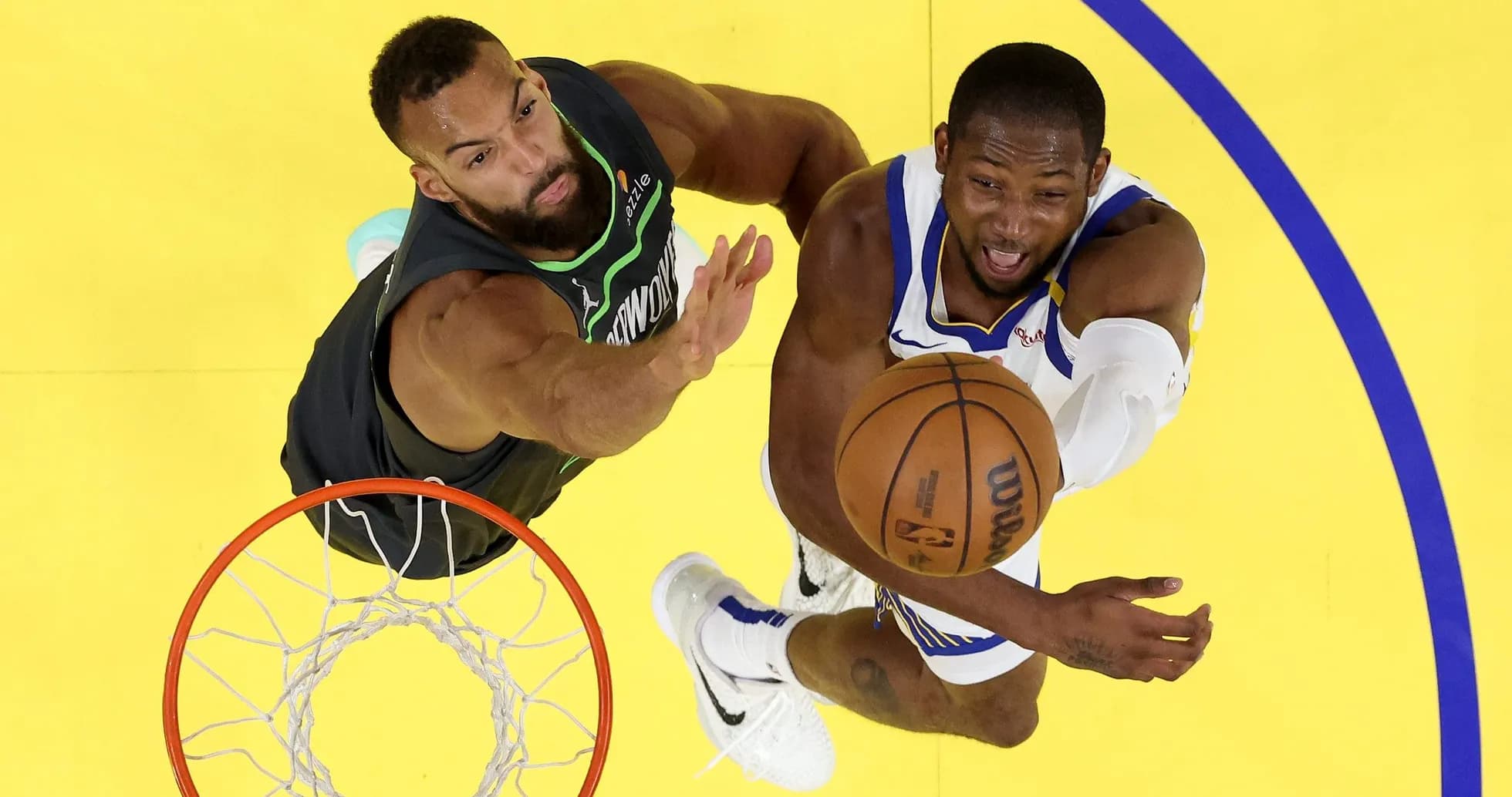 Player attempting a shot while being defended