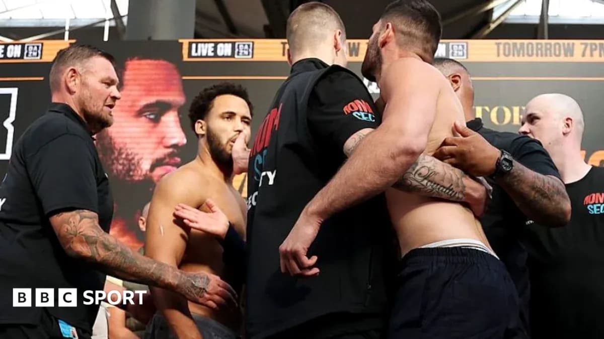 Boxers facing off during weigh-in event
