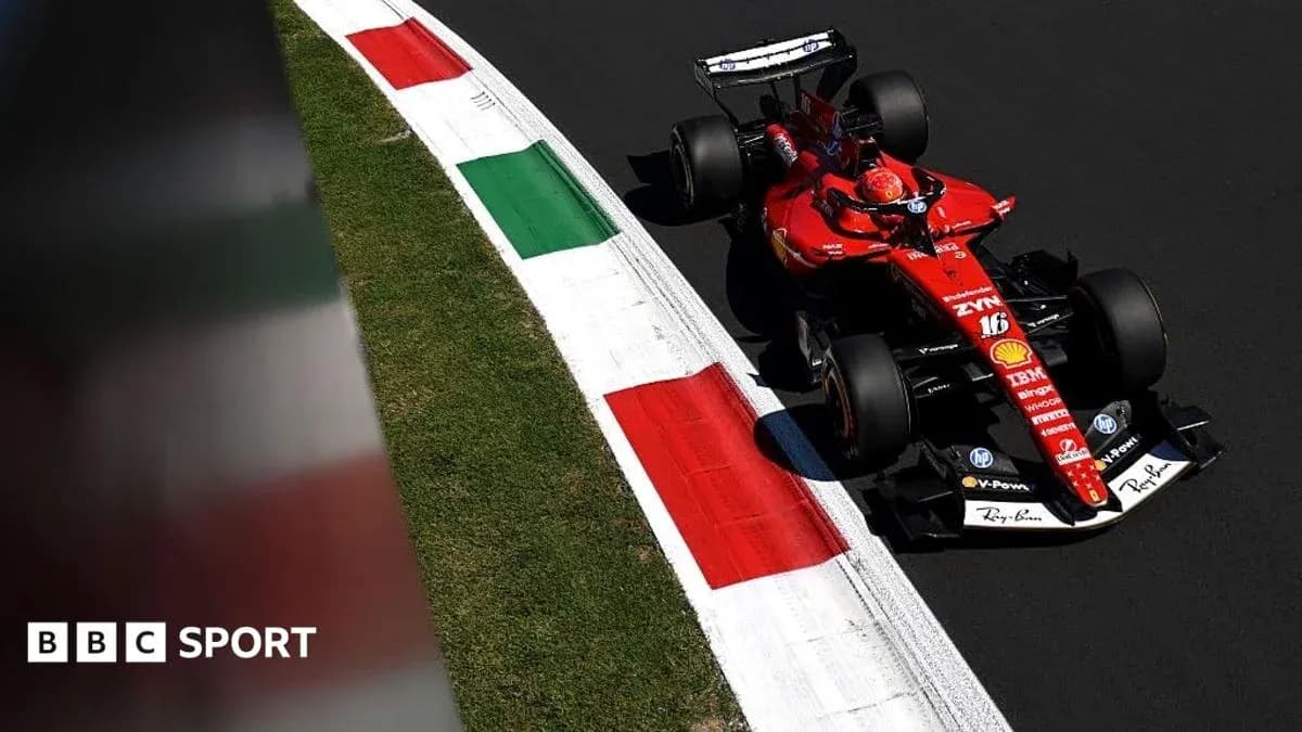 Ferrari car navigating a corner on racetrack