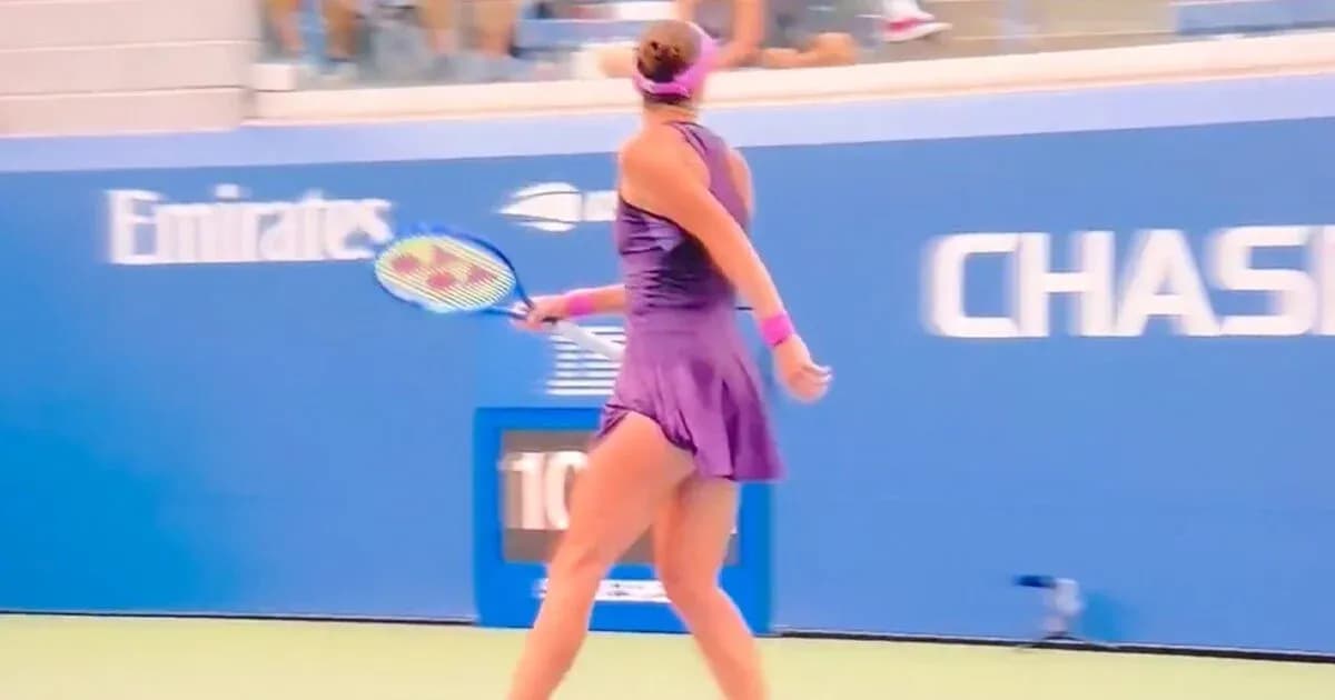 Tennis player preparing to hit a backhand shot