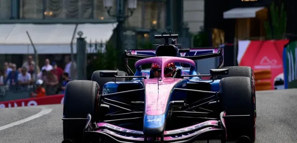 Formula 1 car racing on a street circuit