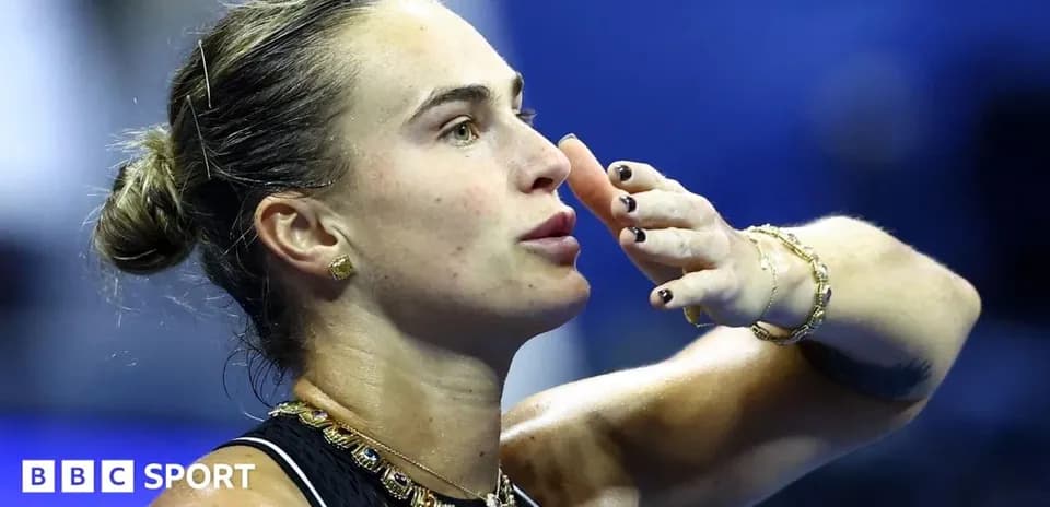 Tennis player gesturing during match celebration