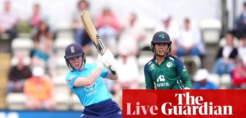 England player batting with Ireland player in background