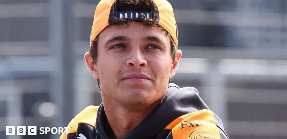 Driver wearing McLaren team gear at event