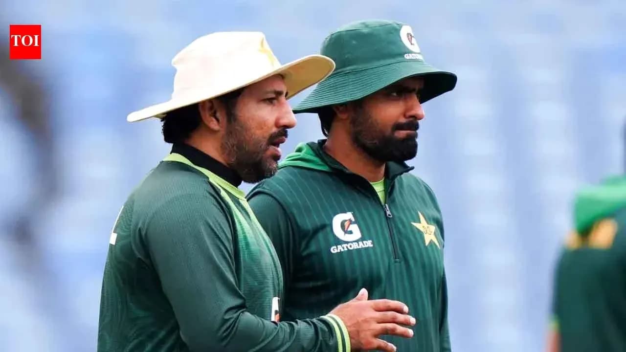 Two Pakistan players discussing during practice session