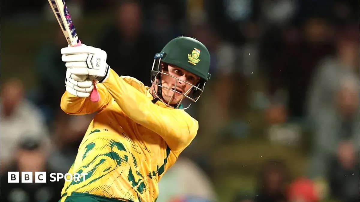 Batsman hitting ball during cricket match
