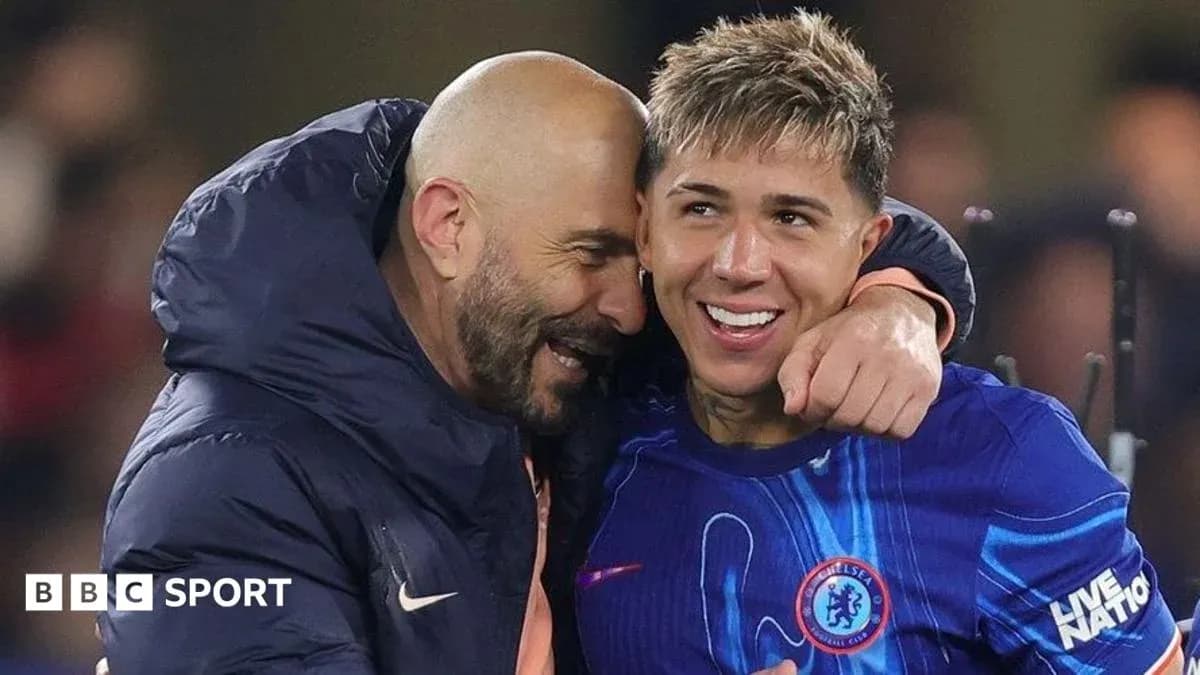 Coach embracing player after match celebration