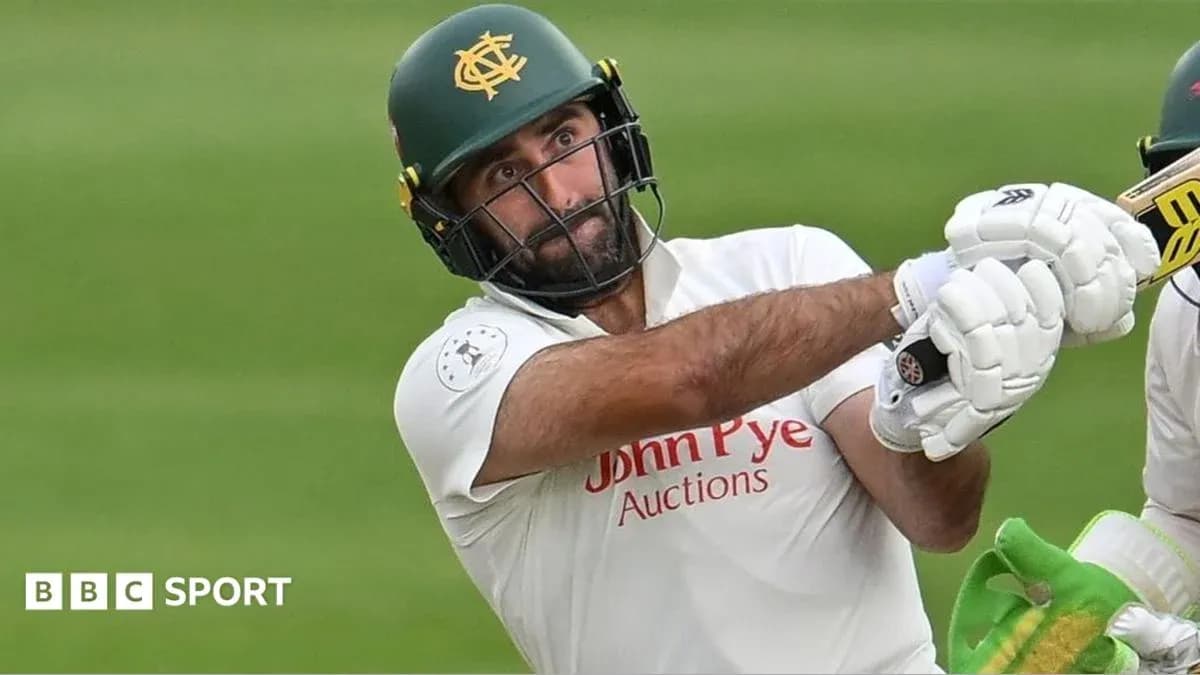 Batsman playing a shot during cricket match