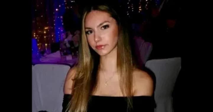 Young woman sitting at a festive event
