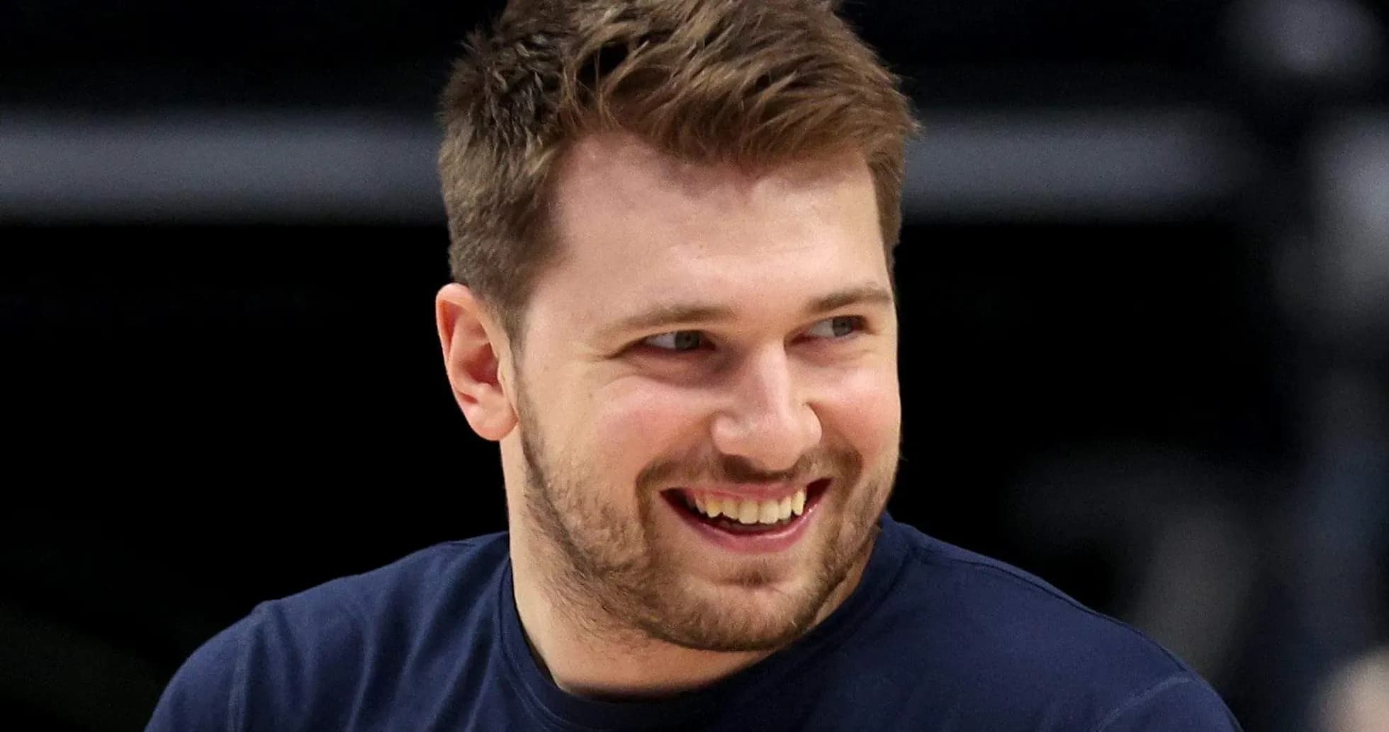 Basketball player smiling during warm-up session