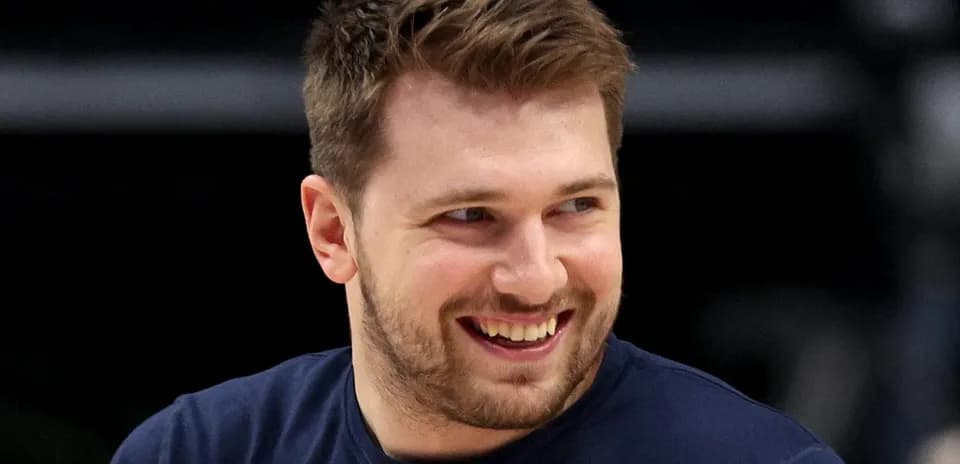 Basketball player smiling during warm-up session