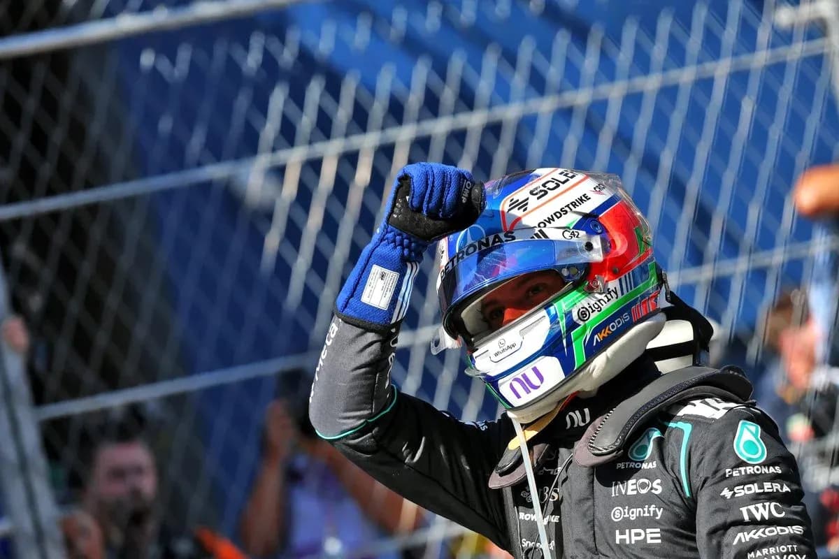 Driver celebrating with raised fist after race
