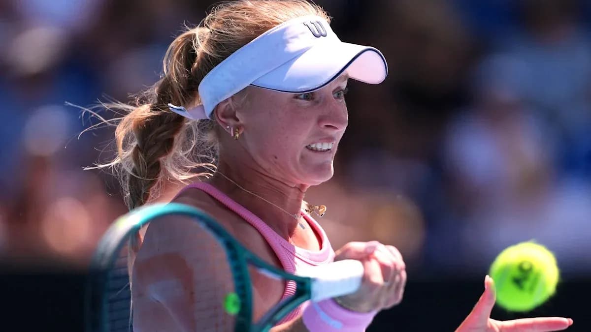 Tennis player hitting a forehand during match