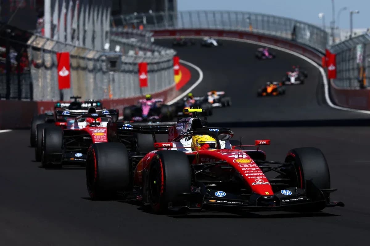 Ferrari car leading a Formula 1 race on track