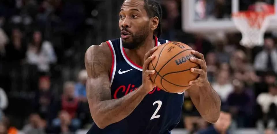 Player dribbling basketball during game action