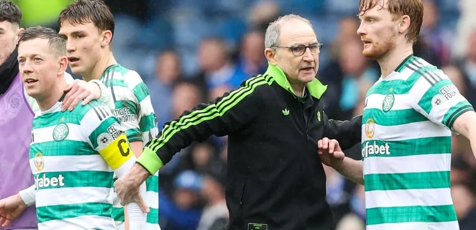 Celtic players and manager discussing during match