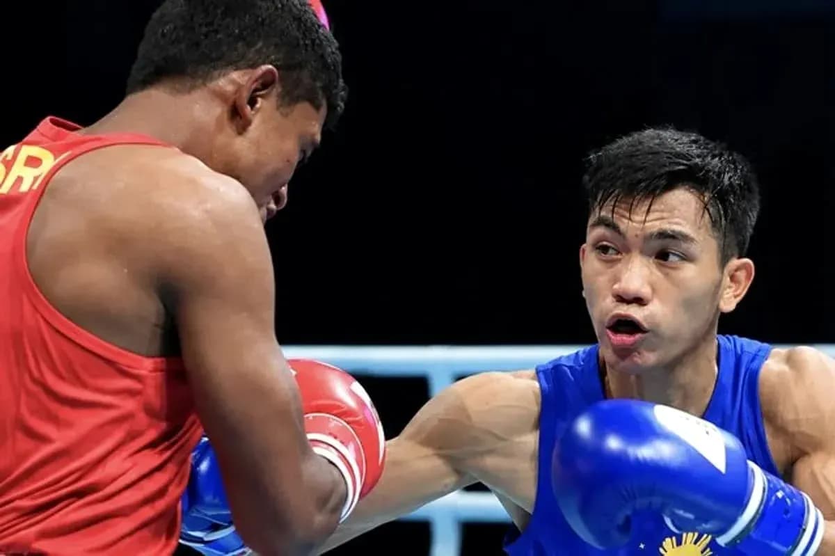 Two boxers exchanging punches in the ring
