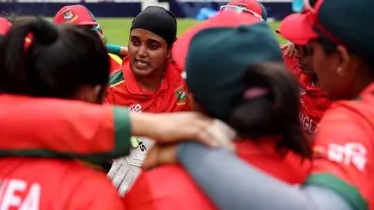 Bangladesh women's team huddled during strategy talk