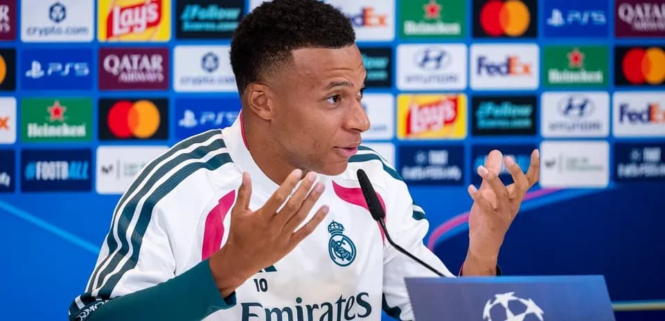 Player speaking at press conference for UEFA Champions League
