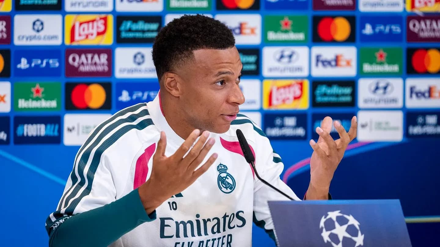 Player speaking at press conference for UEFA Champions League