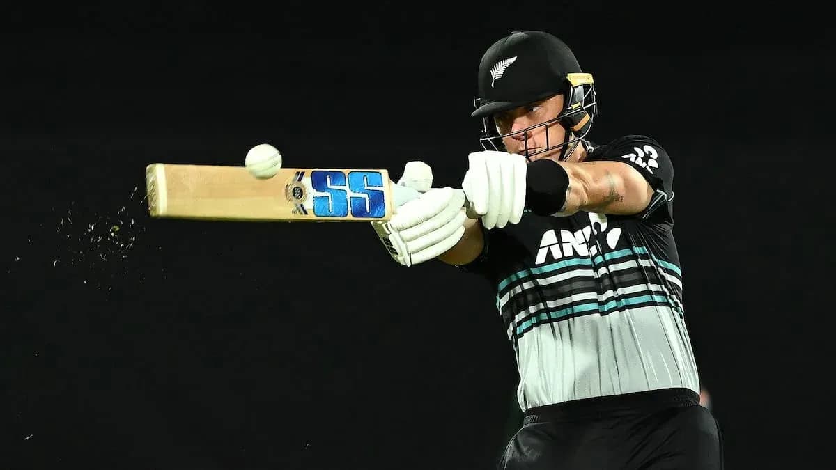 Batsman striking a cricket ball with bat