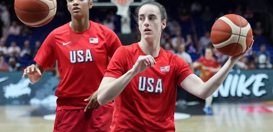 Two players warming up before basketball game