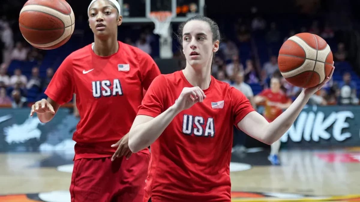 Two players warming up before basketball game