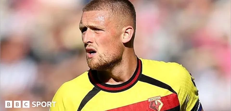 Player in Watford jersey during a match