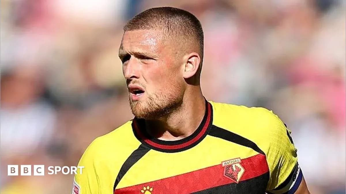 Player in Watford jersey during a match