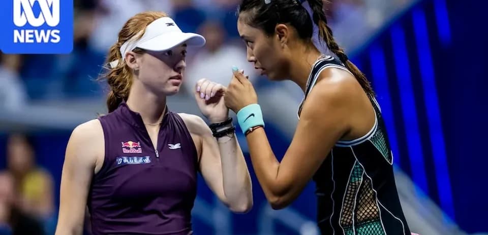Two female tennis players discussing during match