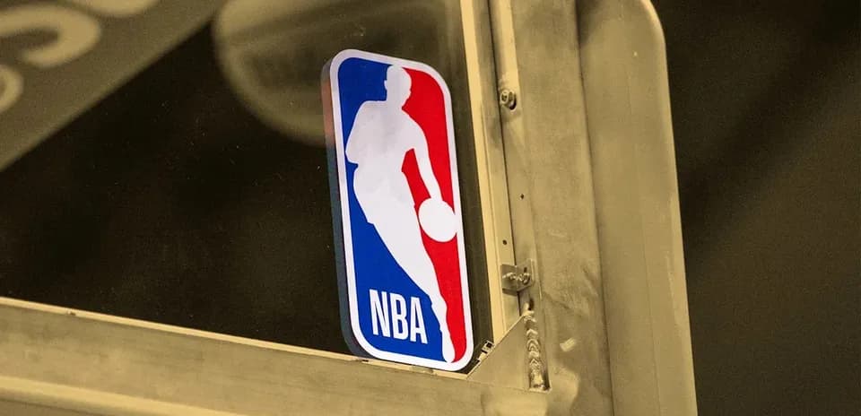 NBA logo sticker on a glass surface