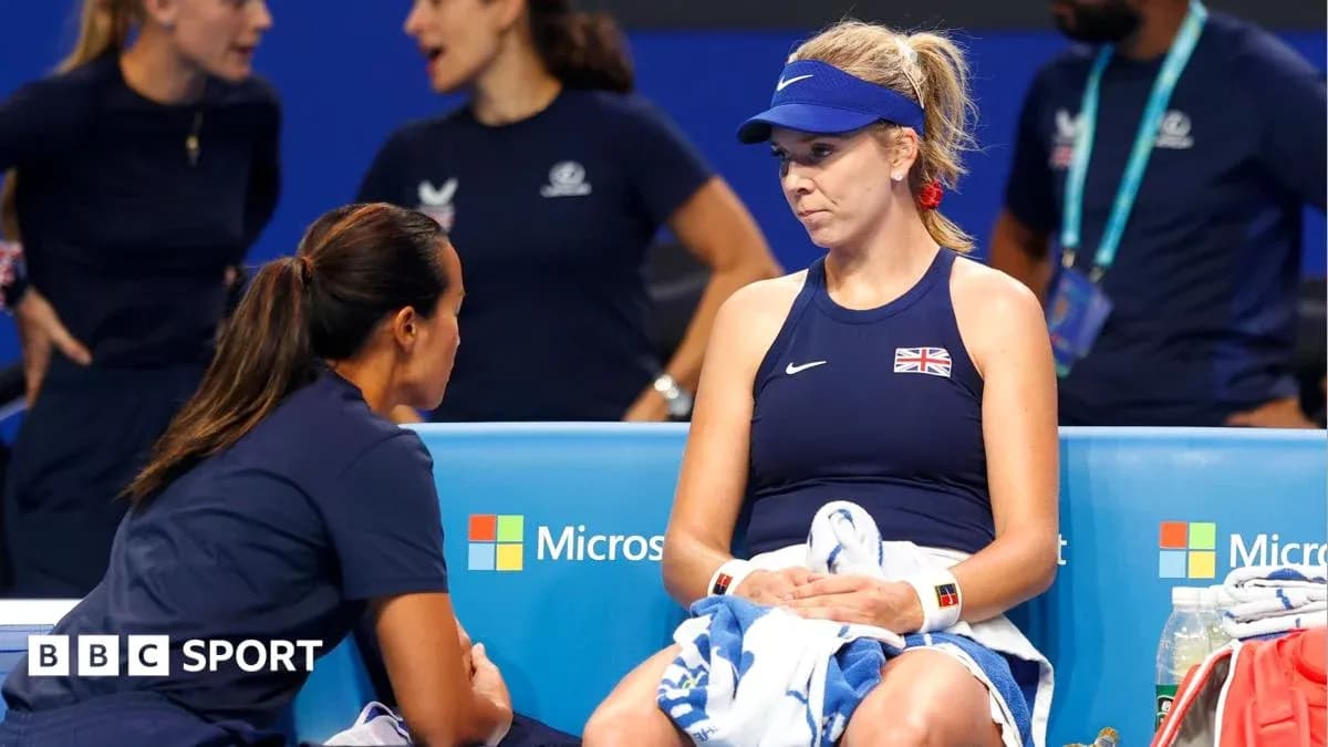 Player receiving coaching during a tennis match