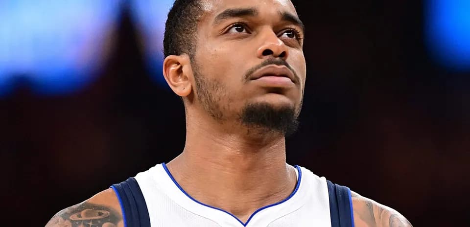 Player in Dallas jersey looking upwards