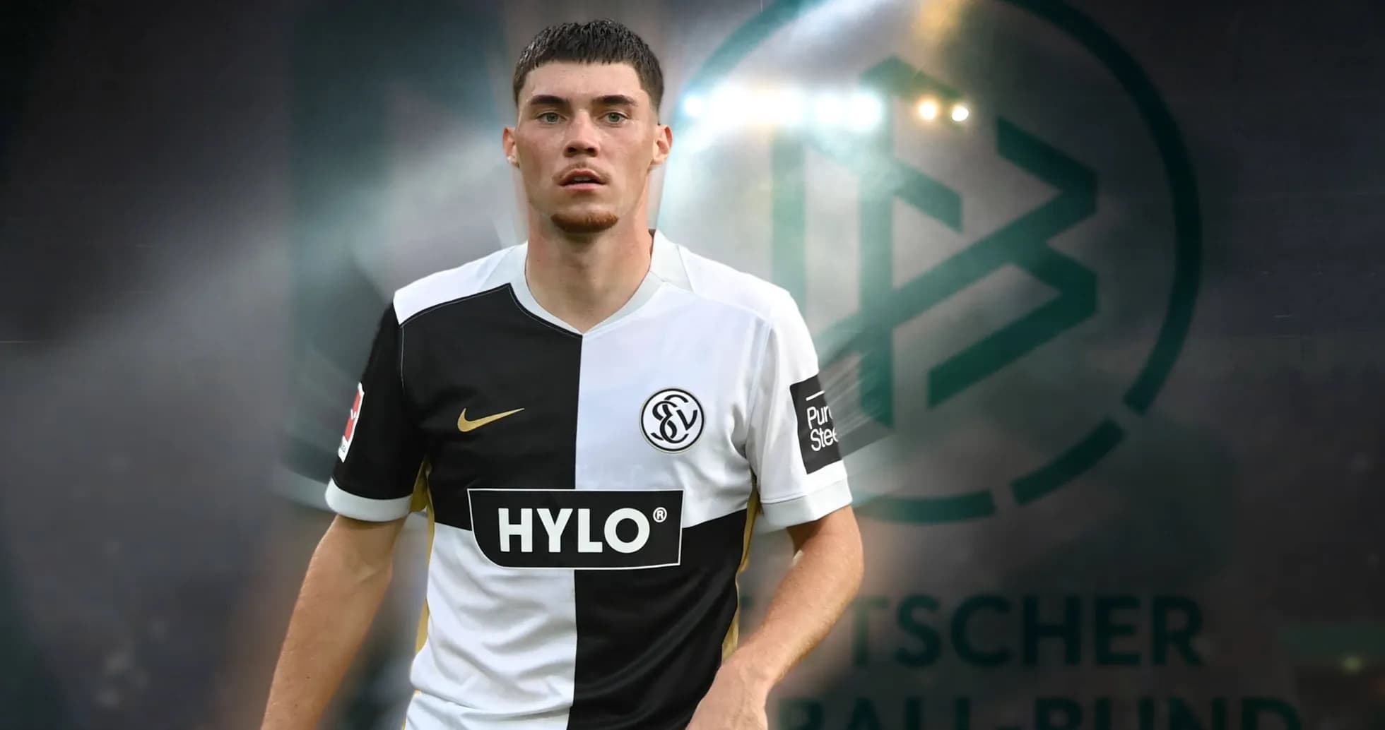 Player in black and white jersey on field