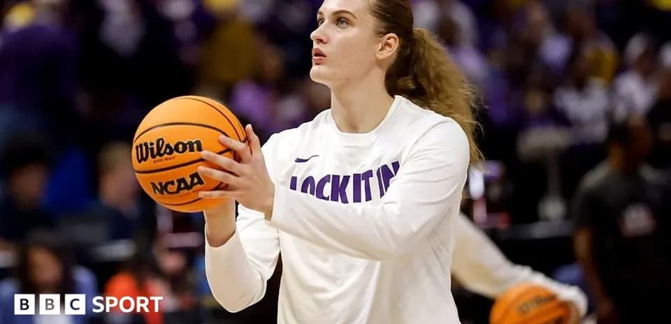Player shooting basketball during warm-up session